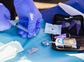 Close-up of hands exchanging a high-quality diagnostic product package.